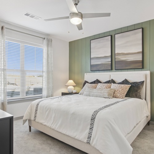 Bedroom with natural lighting and high ceilings