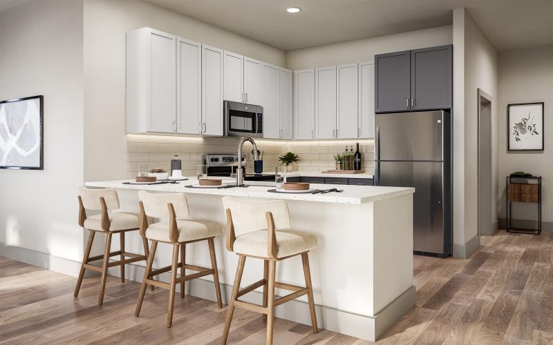 a kitchen with white cabinets