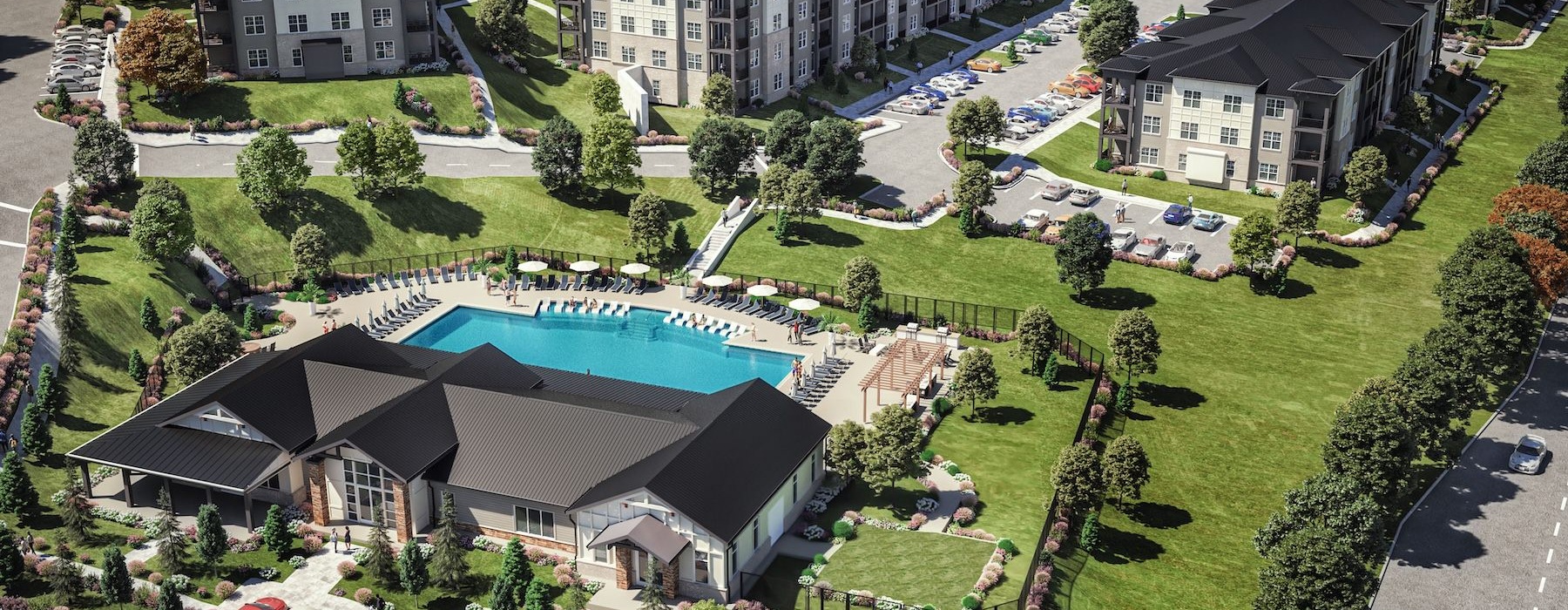 aerial view of large buildings with a pool